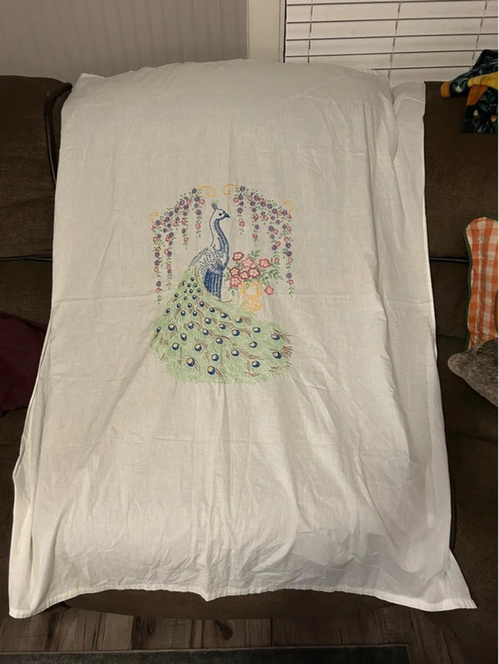 Embroidered peacock linen
